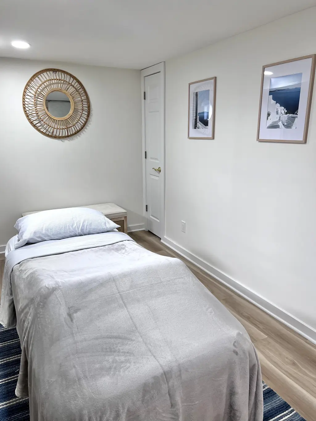 A calm, bright treatment room at Caldera Wellness with a massage table ready for the next client